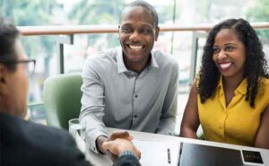 young african american couple meeting with probate and estate planning attorney